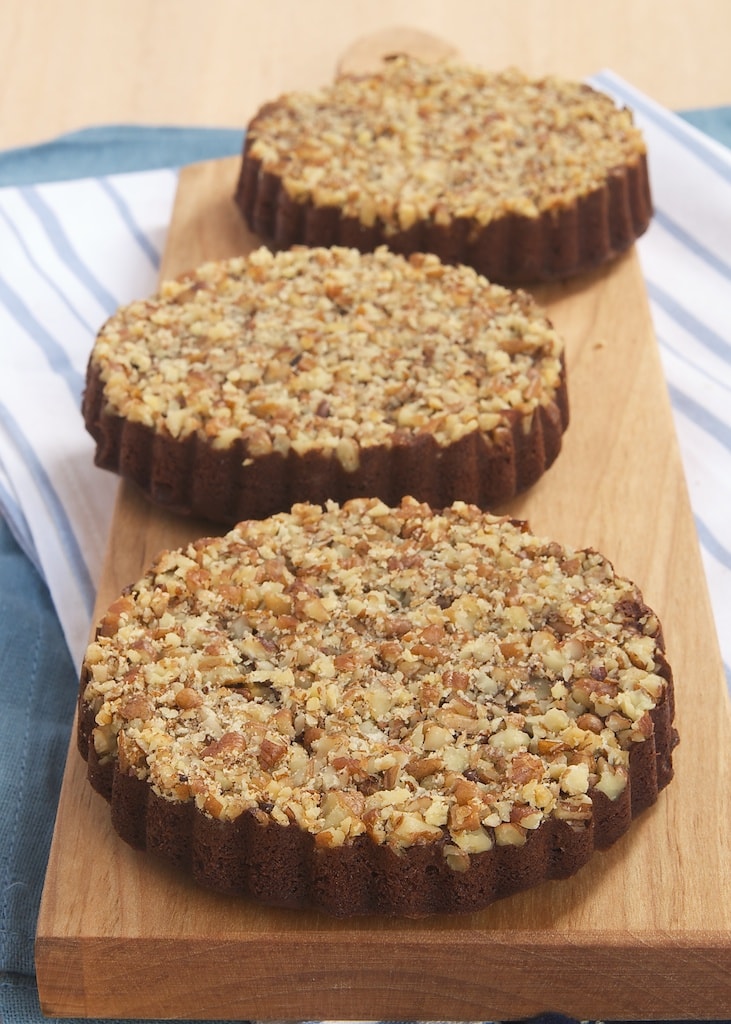 Rich brownies are baked on top of a layer of toasted pecans, then flipped over for a little bit of fancy with Upside-Down Pecan Brownie Tarts.