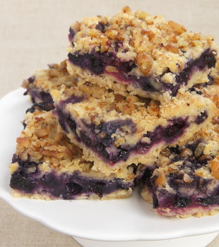 Berry Crumb Bars combine fresh berries with a soft crust and a nutty crumb topping.