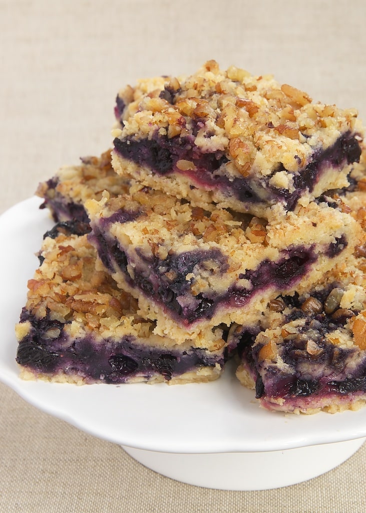 Berry Crumb Bars combine fresh berries with a soft crust and a nutty crumb topping.