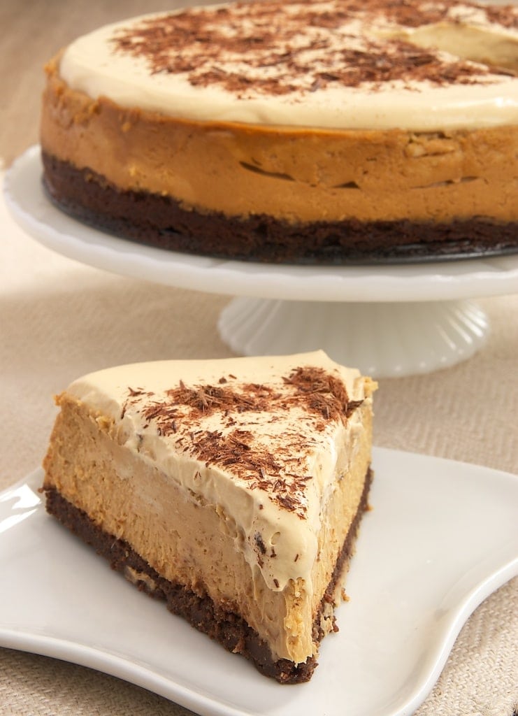 Rich dulce de leche cheesecake sits atop a brownie crust, and it's all topped with whipped cream flavored with even more dulce de leche!