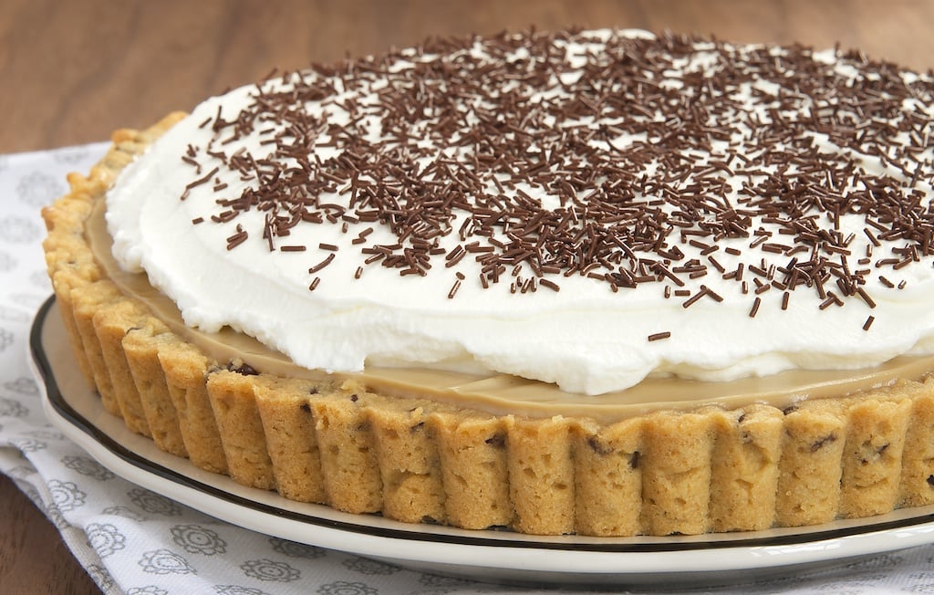 A chocolate chip cookie crust, my favorite homemade butterscotch pudding, and whipped cream combine for an irresistible dessert!