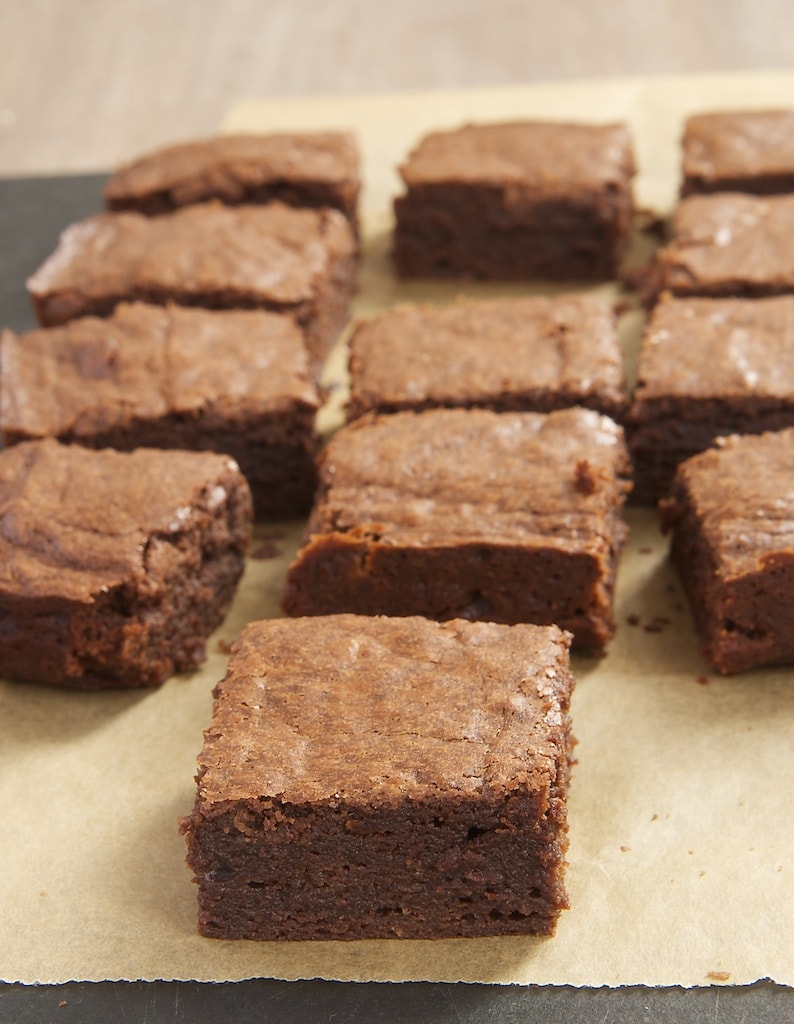 Freshly baked brownies are one of the dessert world's simple pleasures. My Favorite Fudgy Brownies are dark, rich, and utterly delicious!