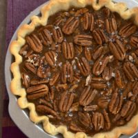 Salted caramel pie in a pie dish.