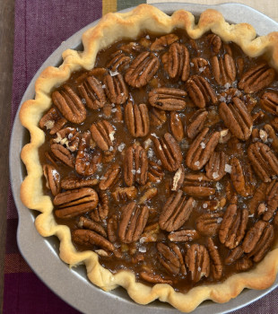 Salted caramel pie in a pie dish.