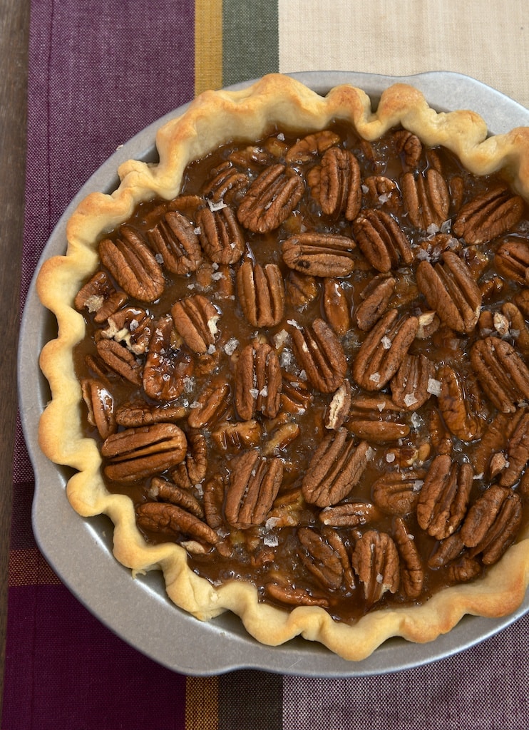 Salted caramel pie in a pie dish.