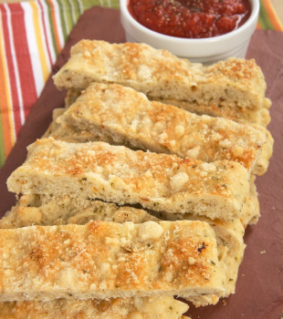 Italian Herb and Cheese Breadsticks are so simple to make with Krusteaz Flatbreads mixes! Serve with your favorite marinara for a great snack.