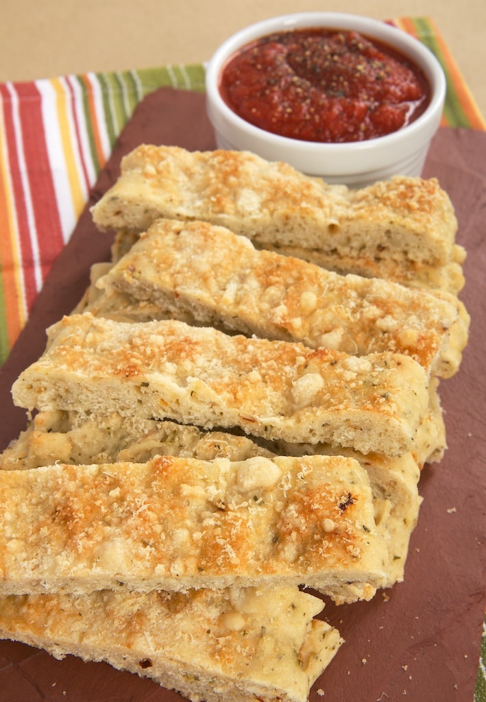 Italian Herb and Cheese Breadsticks are so simple to make with Krusteaz Flatbreads mixes! Serve with your favorite marinara for a great snack.