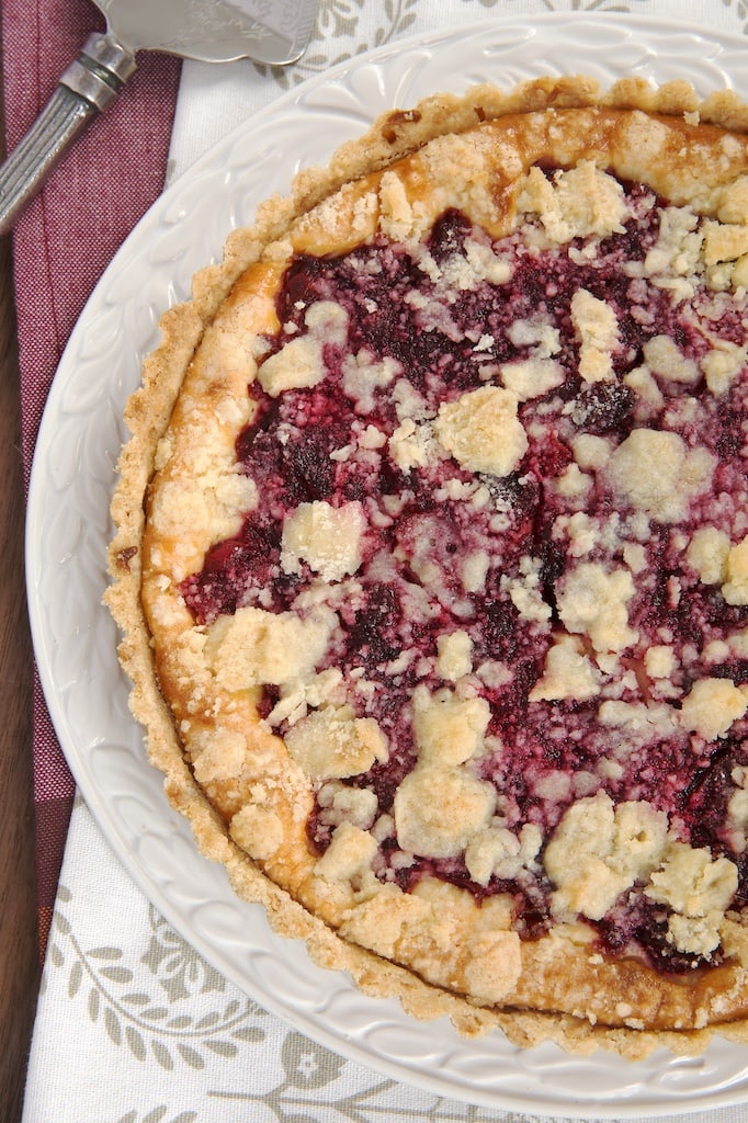 Cranberry Cheesecake Pie on a white cake plate