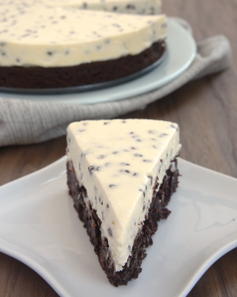 slice of Chocolate Chip Cheesecake on a square white plate