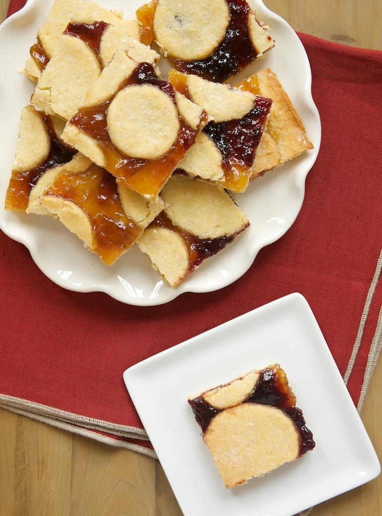 Linzer Bars let you bypass a lot of the rolling and cutting but with the same great flavors as Linzer Cookies!