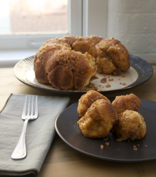 Brown Butter Cinnamon Pecan Pull Apart Bread on plate and serving platter