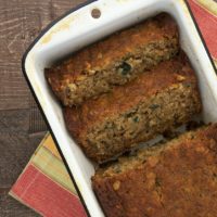 overhead view of Granola Banana Bread in a white metal loaf pan