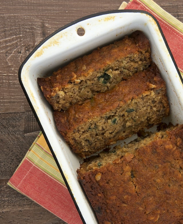 overhead view of Granola Banana Bread in a white metal loaf pan