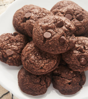 Overhead view of chocolate chocolate chip cookies on cake stand