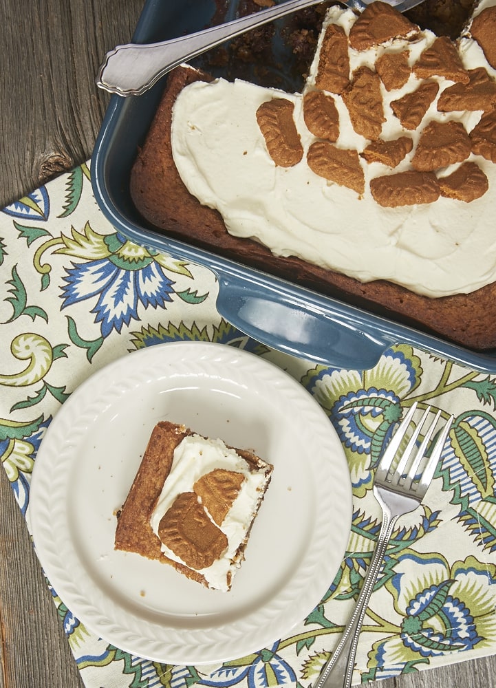 Cookie butter spread and a simple chocolate ganache combine for this flavorful Biscoff Gooey Butter Cake! - Bake or Break