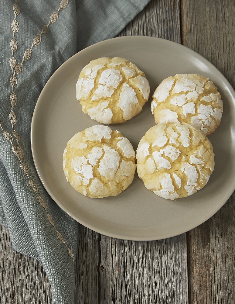 Key Lime Crinkle Cookies on a gray plate