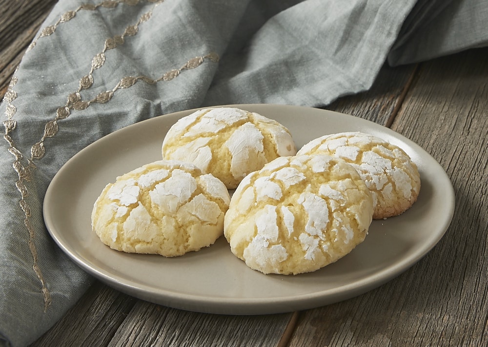 Key limes add a sweet, tart flavor to these Key Lime Crinkle Cookies! - Bake or Break