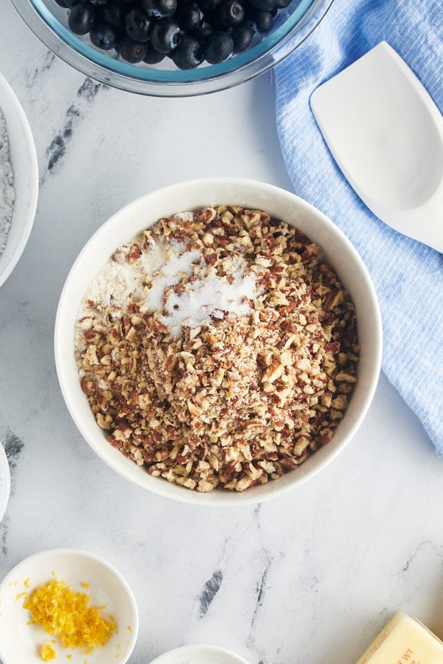 Flour, pecans, and salt in a bowl.