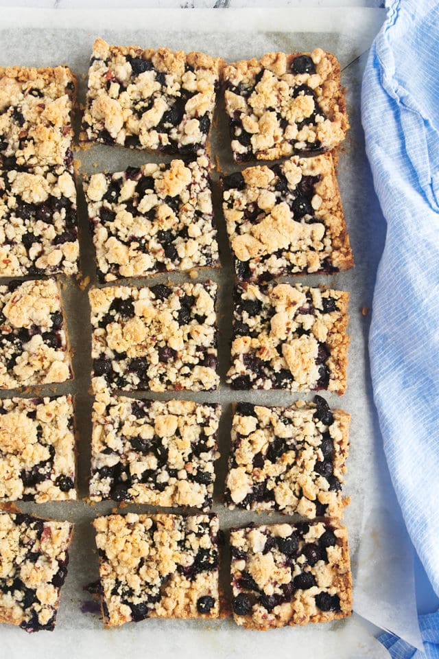 Blueberry pie bars with lemon zest and pecans.