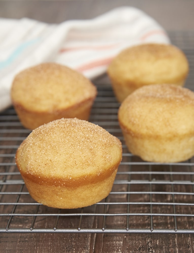 Jam-Filled Doughnut Muffins on a wire cooling rack