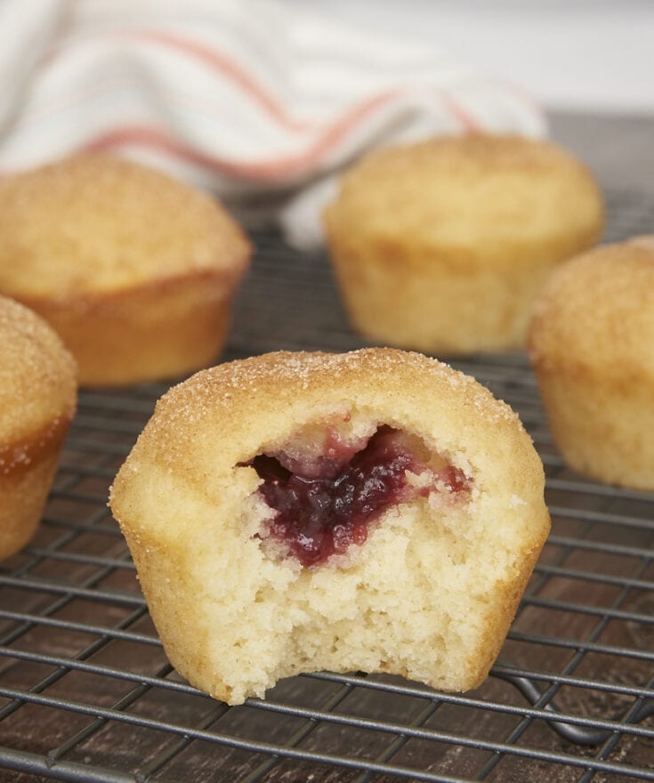 Jam-Filled Doughnut Muffin with a bite missing to show the jam inside