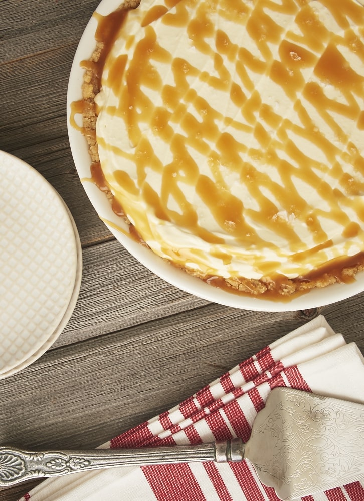 Salted Caramel Whipped Cream Pie is brilliantly simple and delicious. A cookie crust, plenty of sweetened whipped cream, and salty caramel are an irresistible combination! - Bake or Break