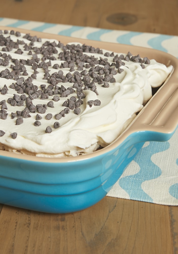 Cannoli Icebox Cake celebrates the flavors of cannoli with a lightly sweet filling, chocolate chips, and graham crackers. A breeze to make! - Bake or Break