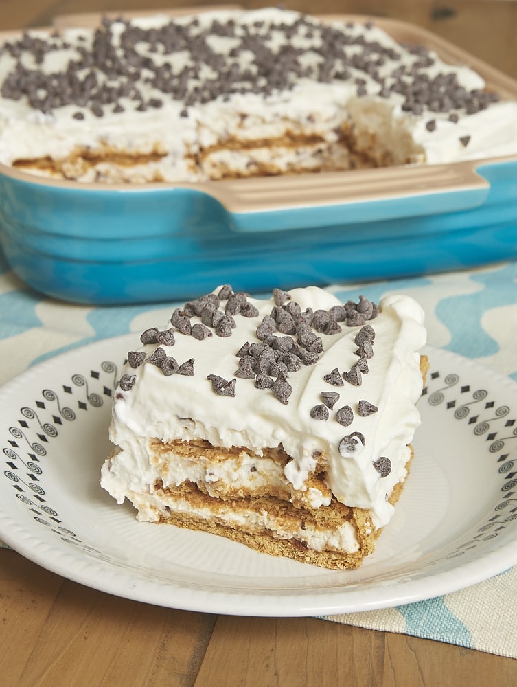 Cannoli Icebox Cake celebrates the flavors of cannoli with a lightly sweet filling, chocolate chips, and graham crackers. A breeze to make! - Bake or Break