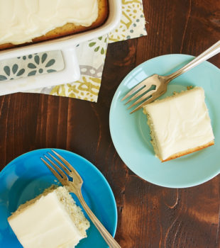 slices of Lemon Poppy Seed Cake served on blue plates