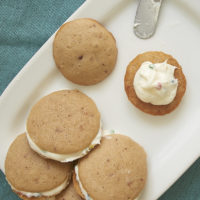 Little strawberry cakes are sandwiched around a sweet frosting for a fruity, handheld treat! - Bake or Break