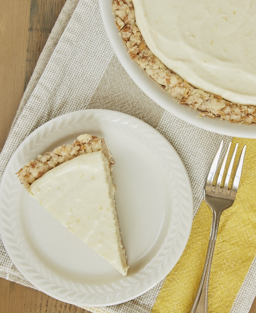 A sweet, tart, creamy lemon filling combines with a buttery coconut crust for a delicious twist on Lemon Icebox Pie! - Bake or Break