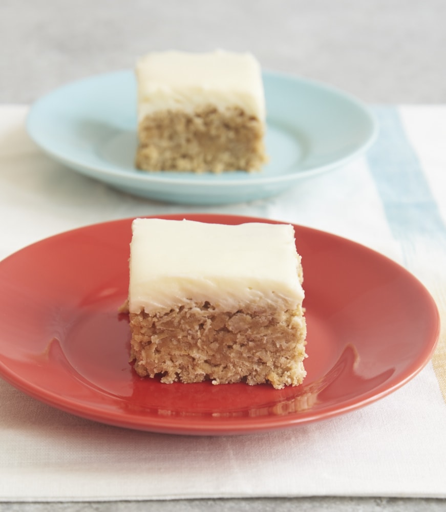 Remember Oatmeal Cream Pies? These simple Frosted Oatmeal Bars recreate that childhood favorite with a quick and easy recipe. - Bake or Break