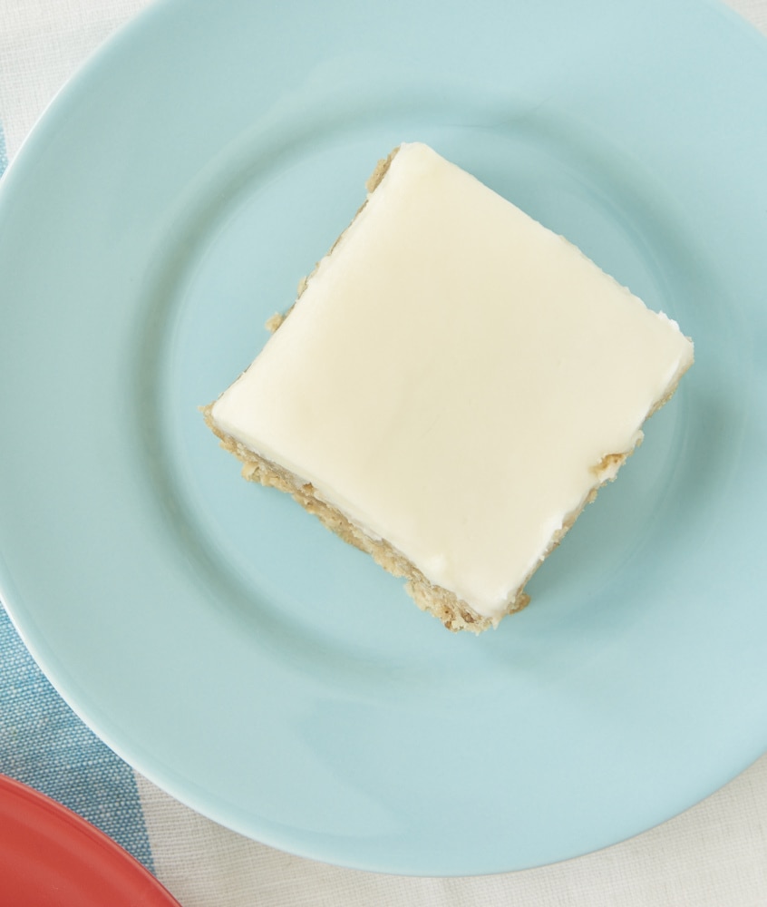 Remember Oatmeal Cream Pies? These simple Frosted Oatmeal Bars recreate that childhood favorite with a quick and easy recipe. - Bake or Break