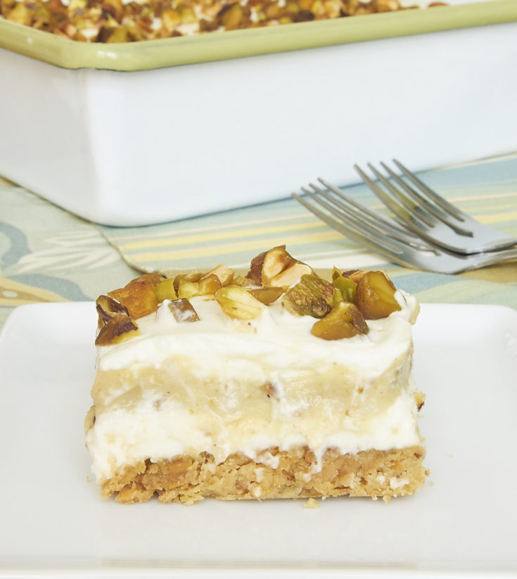 Pistachio Pudding Bars combine a nutty crust, sweetened cream cheese, pistachio pudding, and sweetened whipped cream for an unforgettable, irresistible dessert. All from scratch! - Bake or Break