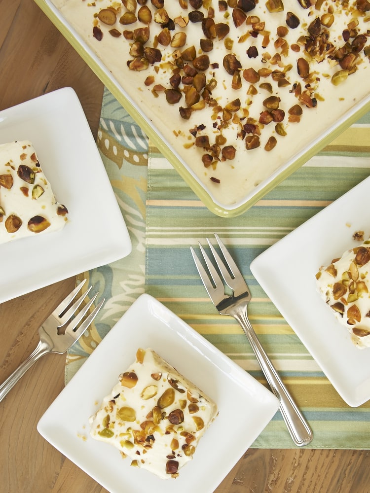 Pistachio Pudding Bars combine a nutty crust, sweetened cream cheese, pistachio pudding, and sweetened whipped cream for an unforgettable, irresistible dessert. All from scratch! - Bake or Break