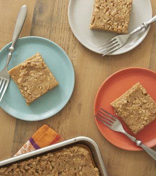 overhead view of slices of Praline Sheet Cake on colorful plates