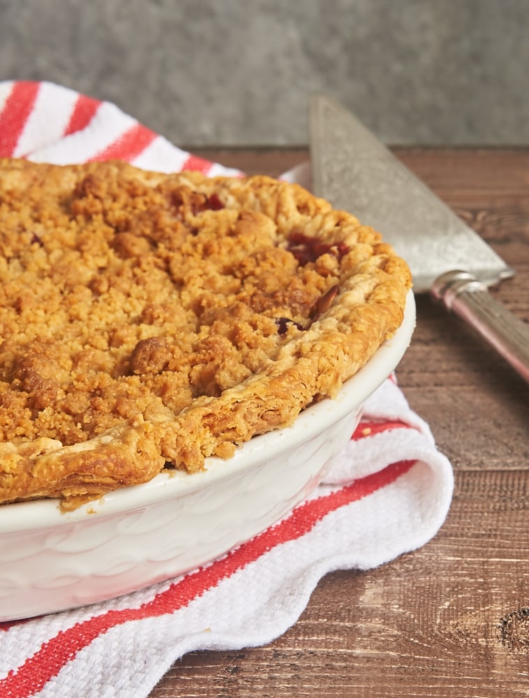 Apple Cranberry Crumb Pie is a sweet, tart, absolutely delicious pie. That fruity filling and a sweet, buttery crumb topping make this one irresistible dessert! - Bake or Break