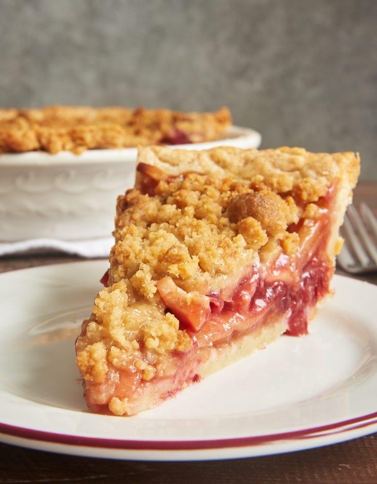 Apple Cranberry Crumb Pie is a sweet, tart, absolutely delicious pie. That fruity filling and a sweet, buttery crumb topping make this one irresistible dessert! - Bake or Break