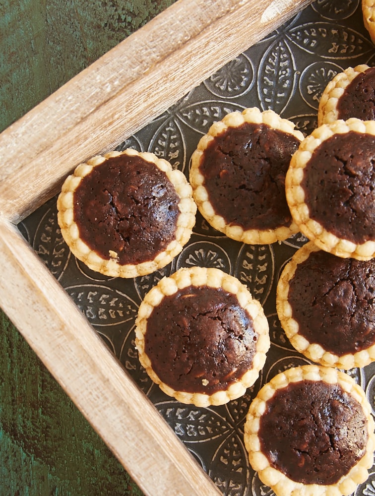 overhead view of Chocolate Peanut Butter Tassies on a metal tray