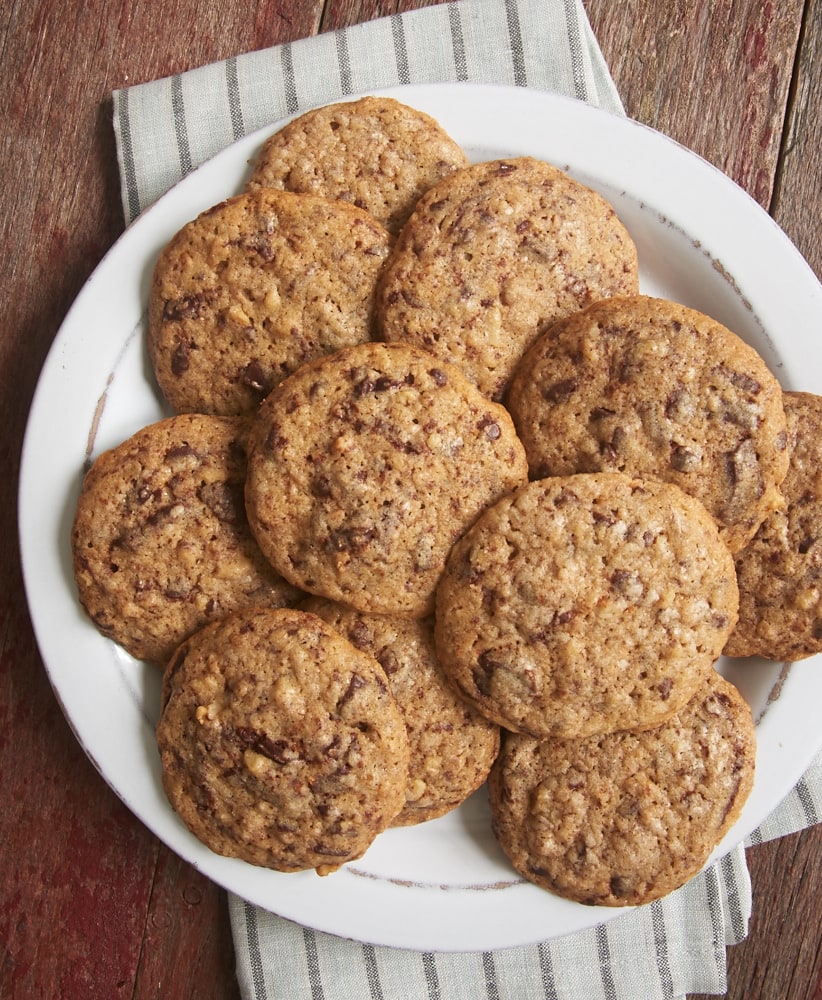 A blend of spices adds a delicious twist to traditional cookies in these Spiced Chocolate Chip Cookies! - Bake or Break