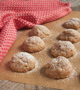 Toffee Pecan Snowdrop Cookies on parchment paper