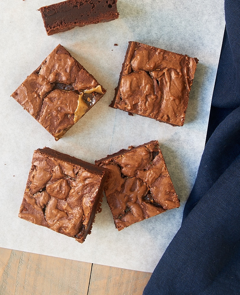 overhead view of Salted Caramel Brownies on parchment paper