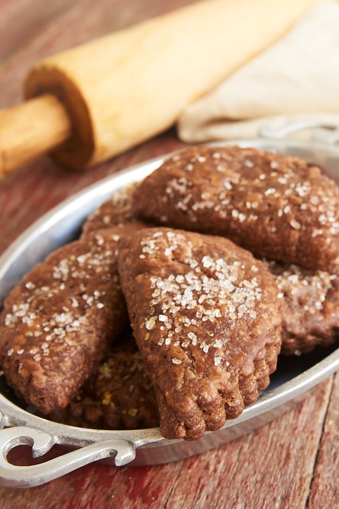 These Chocolate Hand Pies feature a rich, fudgy filling wrapped inside chocolate pie crust. Chocolate lovers will devour these! - Bake or Break