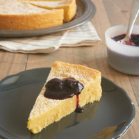 Almond Gâteau Breton topped with blueberry sauce