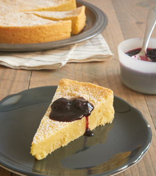 Almond Gâteau Breton topped with blueberry sauce