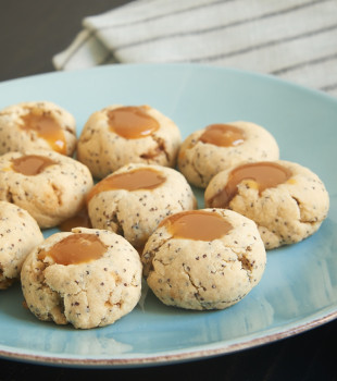 Almond Poppy Seed Thumbprint Cookies are simple, nutty cookies filled with caramel. Or try filling them with your favorite fruit preserves or nut butter! - Bake or Break