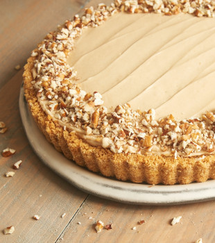 Brown Sugar Banana No-Bake Cheesecake topped with chopped pecans