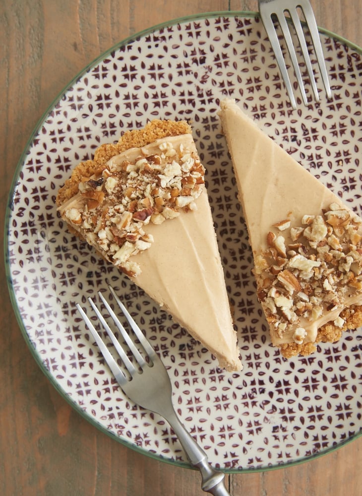 two slices of Brown Sugar Banana No-Bake Cheesecake on a plate