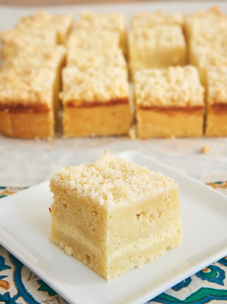 Lemon Cream Cheese Coffee Cake is bursting with sweet lemon flavor and filled with a layer of sweetened cream cheese. A great anytime treat! - Bake or Break