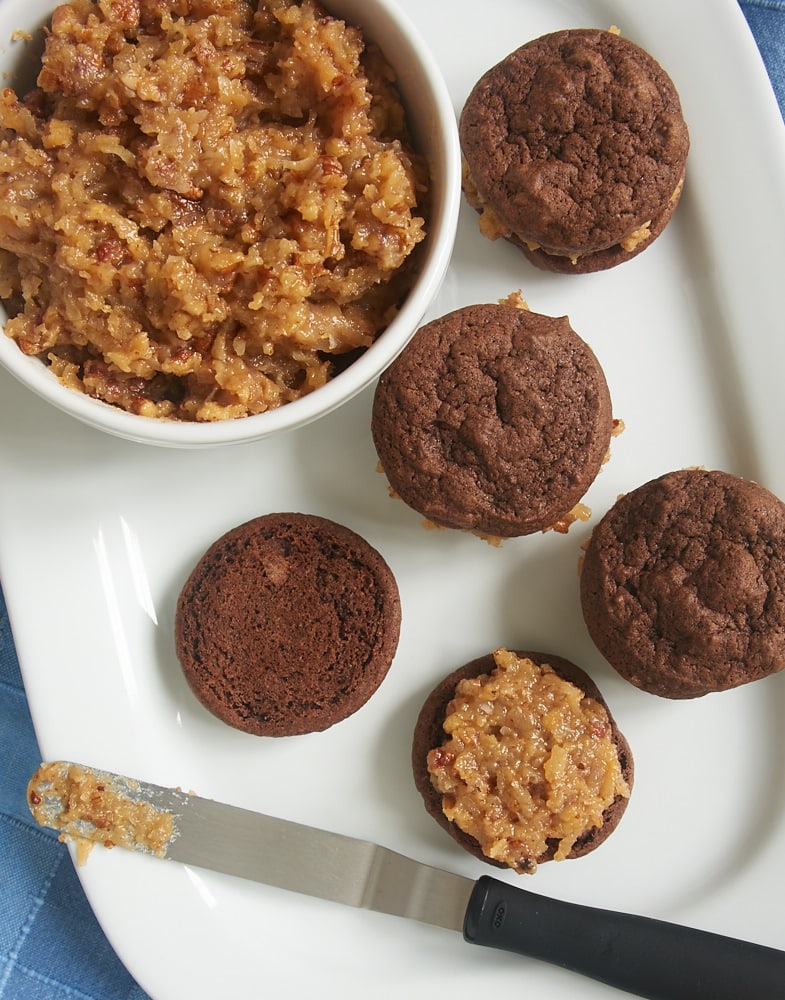 assembling Chocolate Coconut Pecan Sandwich Cookies